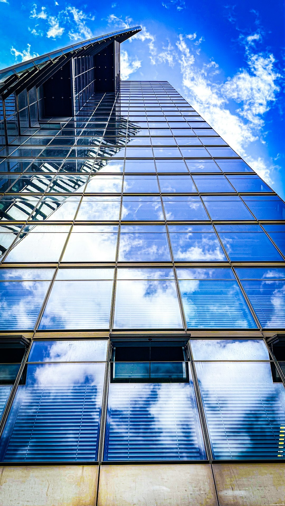 Modern glass office building exterior in a European city